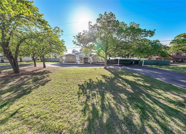 view of yard featuring a carport