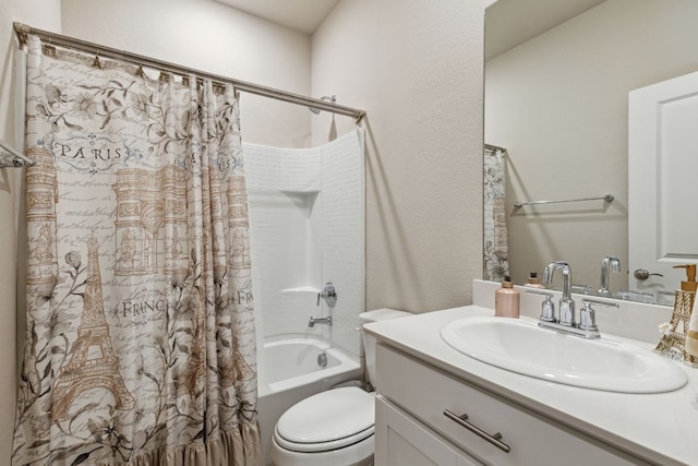 full bathroom with vanity, toilet, and shower / tub combo with curtain