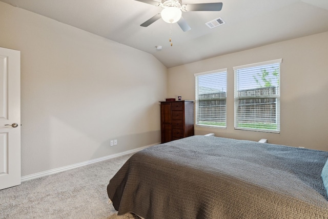 carpeted bedroom featuring lofted ceiling and ceiling fan