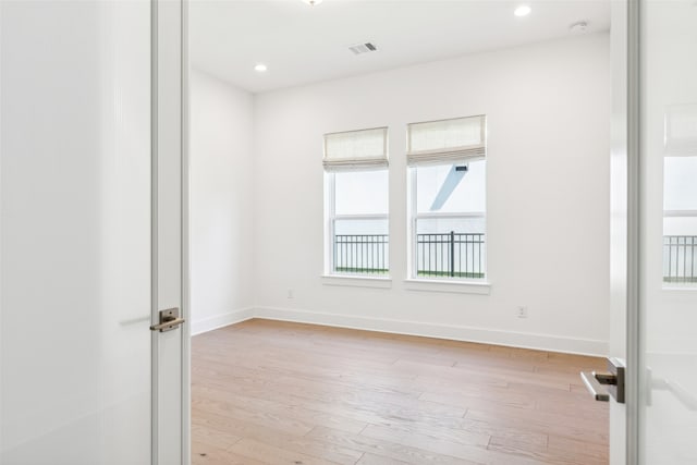 empty room featuring light hardwood / wood-style floors