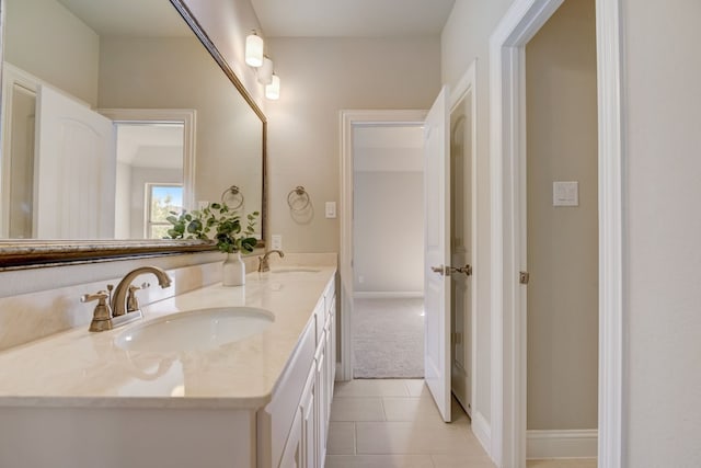 bathroom with vanity and tile patterned flooring