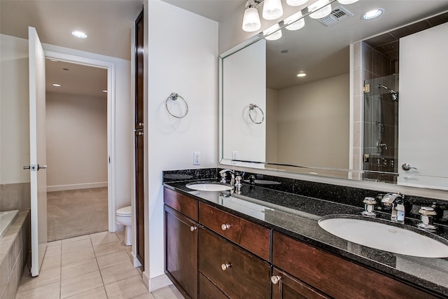 full bathroom featuring toilet, tile floors, double vanity, and shower with separate bathtub