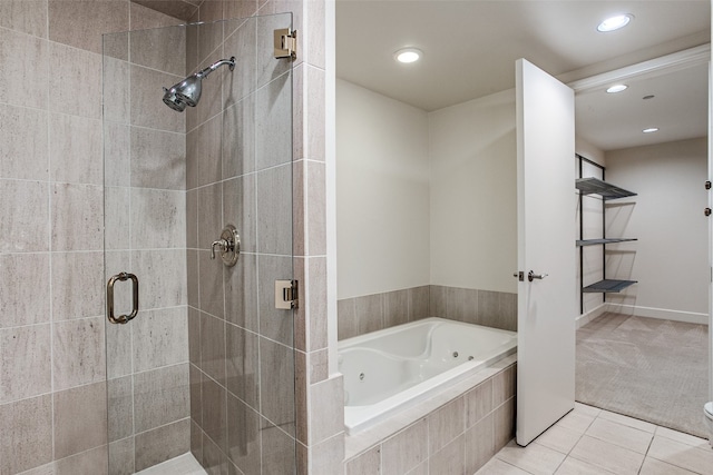 bathroom with separate shower and tub and tile floors