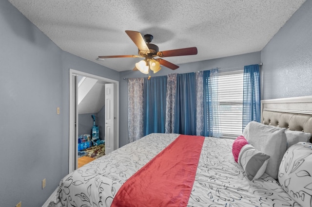 bedroom featuring a textured ceiling and ceiling fan