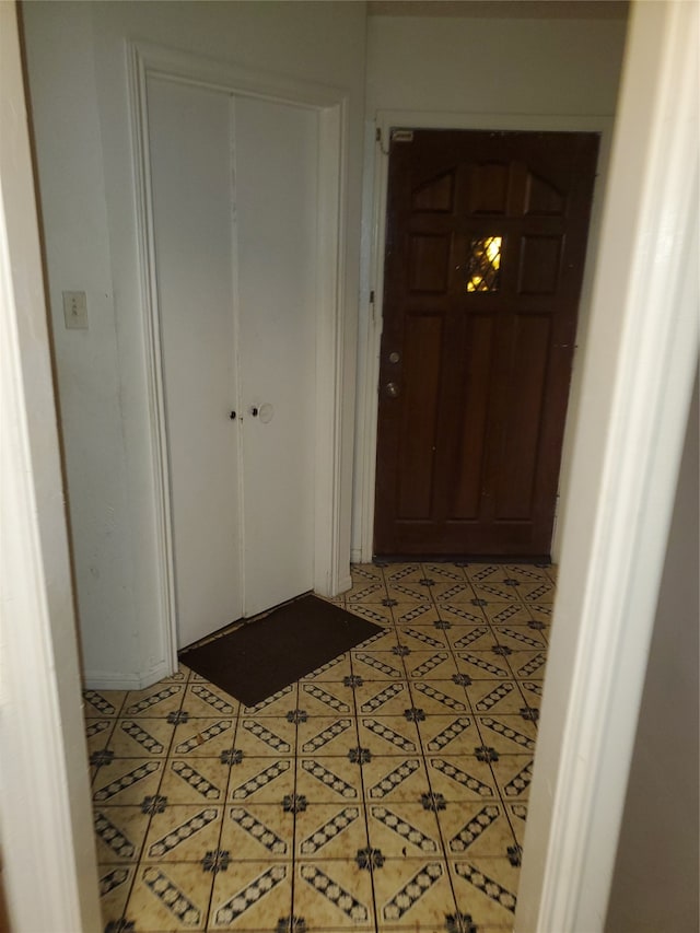 view of tiled entrance foyer