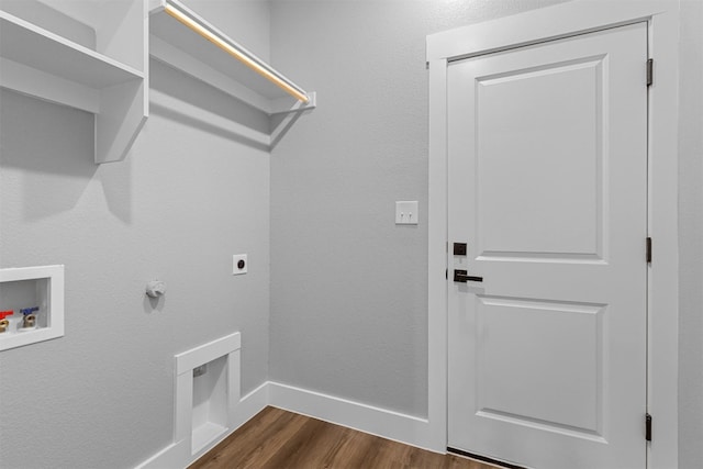 laundry room featuring dark hardwood / wood-style floors, hookup for an electric dryer, and hookup for a washing machine