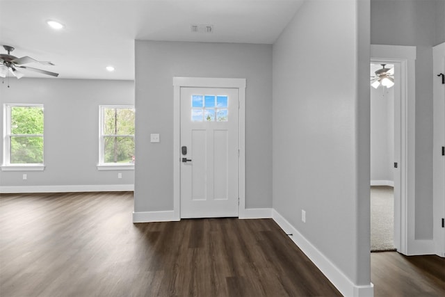 foyer entrance featuring dark hardwood / wood-style flooring and ceiling fan