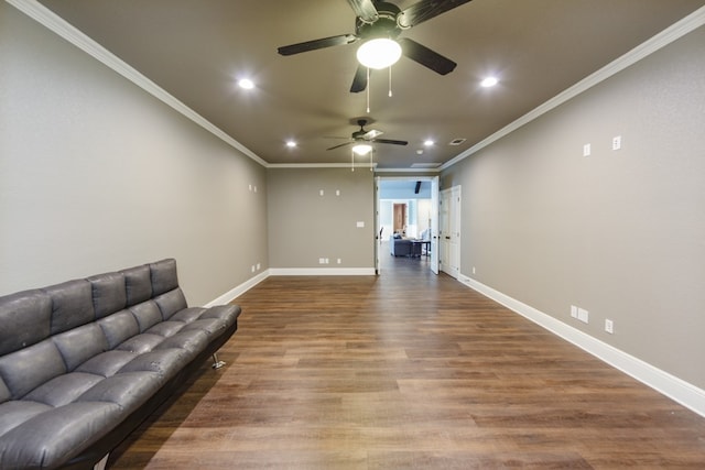 living room featuring ceiling fan, hardwood / wood-style flooring, and ornamental molding