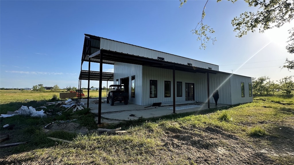 rear view of house with a patio area