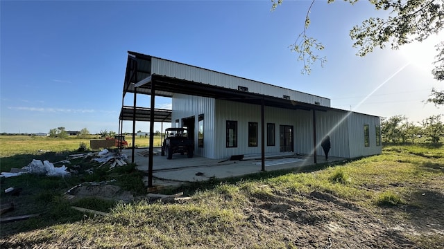 rear view of house with a patio area