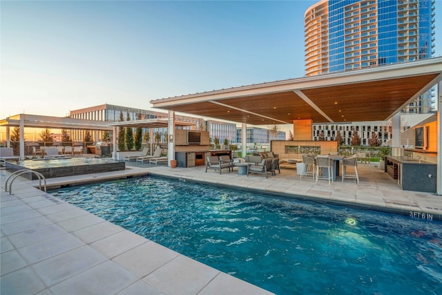 view of swimming pool featuring a patio