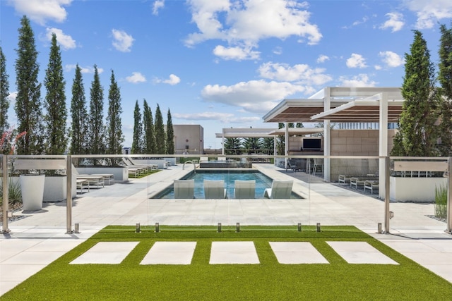 view of pool featuring a patio area and a jacuzzi