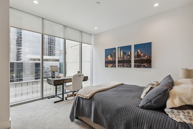 bedroom featuring light colored carpet