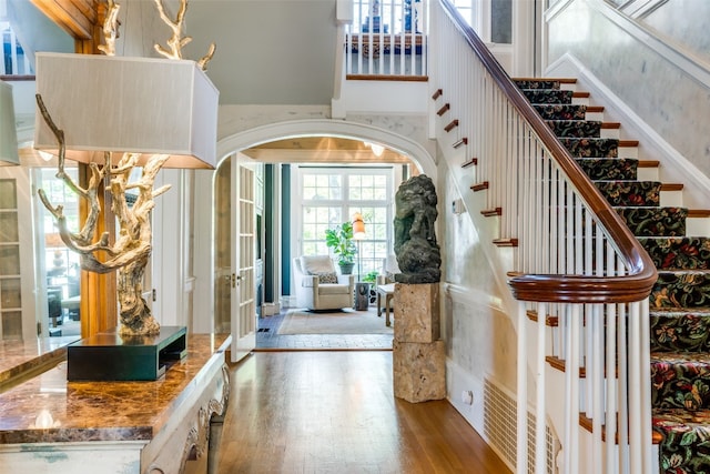 foyer entrance with light wood-type flooring