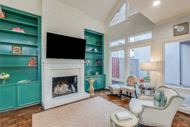 living area featuring a brick fireplace, vaulted ceiling, dark parquet floors, and a wealth of natural light