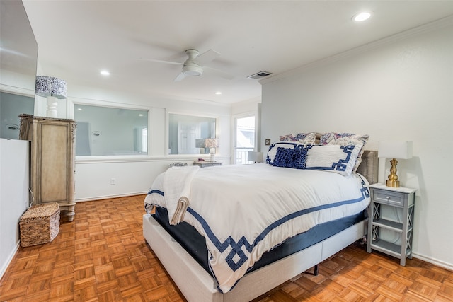 bedroom featuring ceiling fan, ornamental molding, and light parquet floors