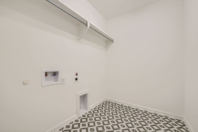 clothes washing area featuring hookup for a gas dryer, tile patterned floors, electric dryer hookup, and hookup for a washing machine