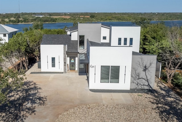 back of property with a patio