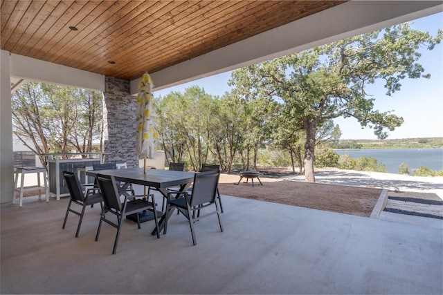 view of patio / terrace with a water view