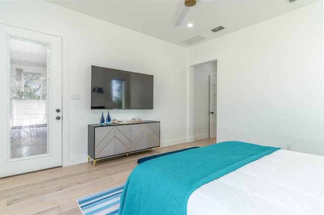 bedroom with ceiling fan and light wood-type flooring