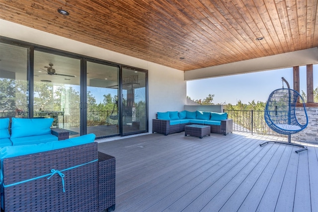 wooden terrace featuring outdoor lounge area