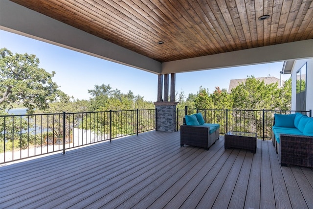 wooden deck featuring an outdoor hangout area