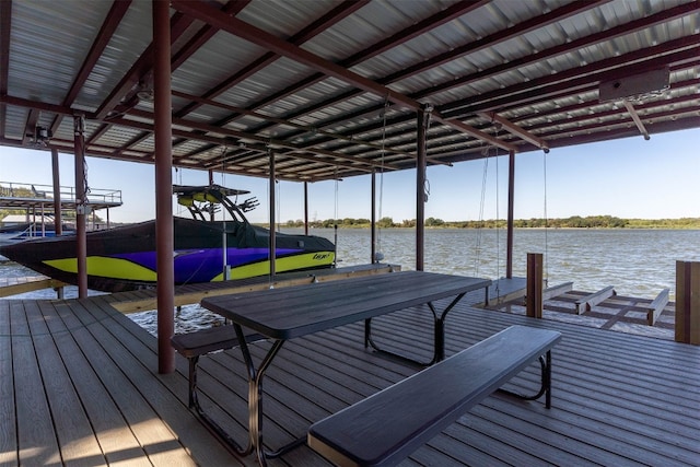 dock area with a water view