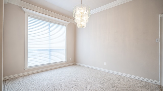 carpeted spare room with crown molding and an inviting chandelier