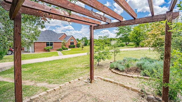 view of yard with a pergola