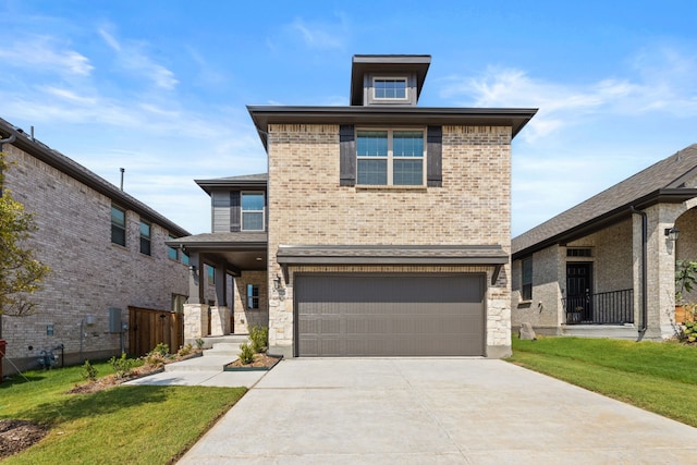 view of front property featuring a garage and a front lawn