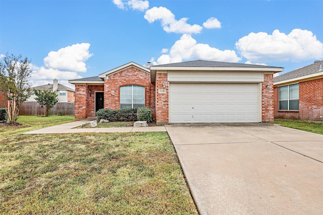 single story home with a garage and a front yard