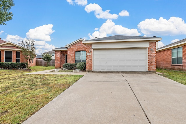 ranch-style house with a garage and a front yard