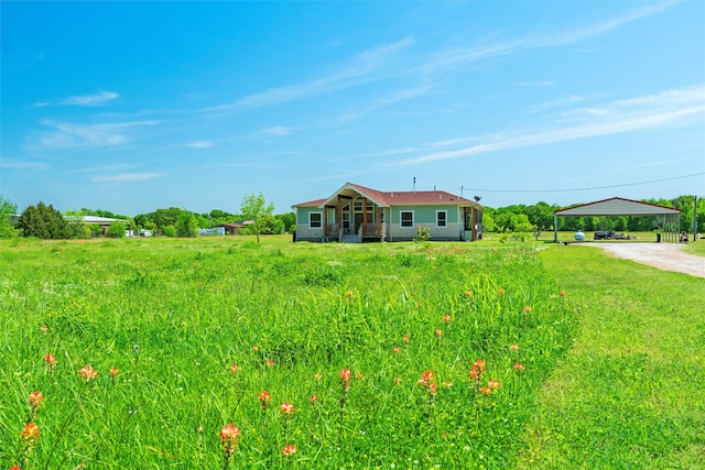 ranch-style home with a front yard