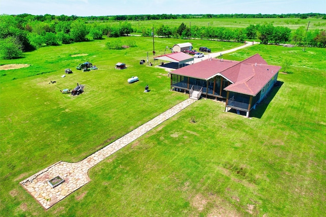 birds eye view of property featuring a rural view