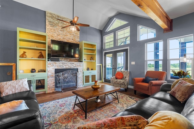 living room featuring a fireplace, high vaulted ceiling, dark wood-type flooring, ceiling fan, and beam ceiling