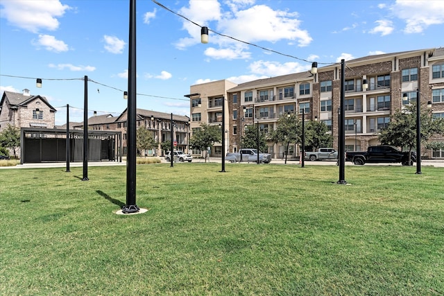 surrounding community featuring a yard