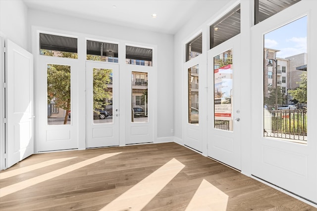 entryway with light hardwood / wood-style flooring