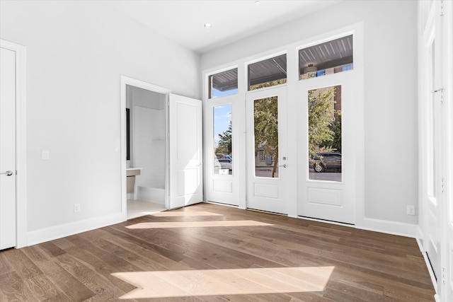 foyer with hardwood / wood-style floors