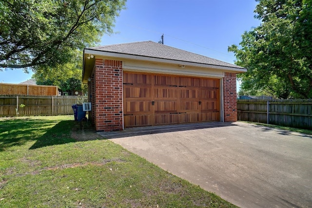 garage with a yard