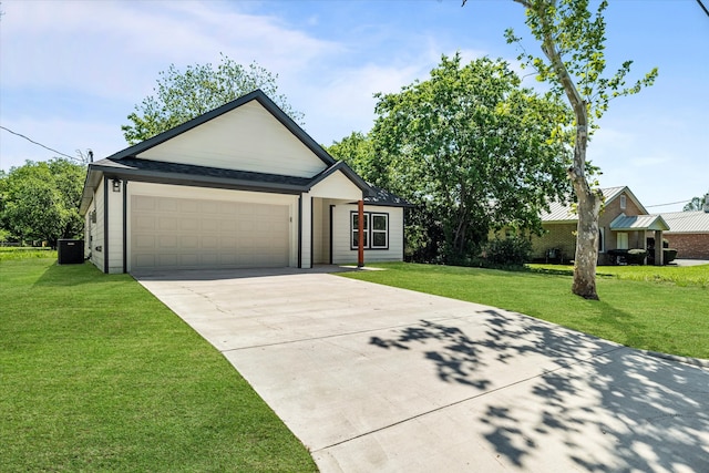 ranch-style home with central air condition unit, a garage, and a front lawn