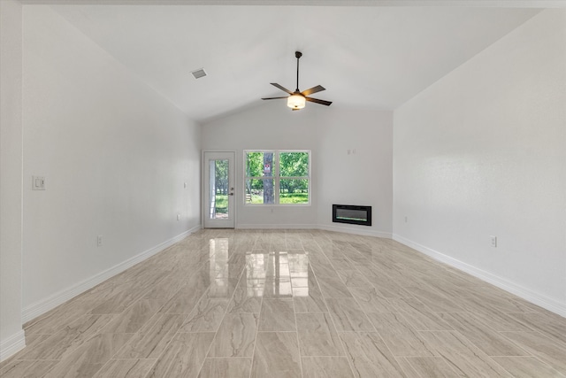 unfurnished living room with lofted ceiling and ceiling fan