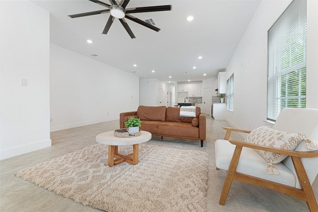 living room featuring ceiling fan