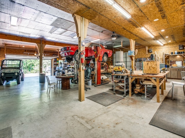 garage with a workshop area