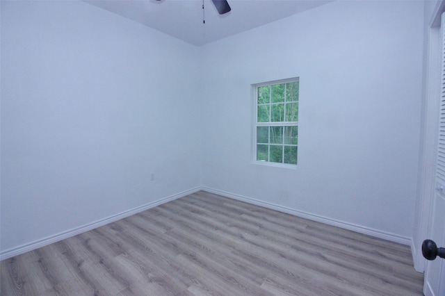 unfurnished room with light hardwood / wood-style floors and ceiling fan