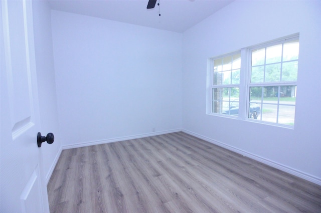 unfurnished room with light hardwood / wood-style floors and ceiling fan