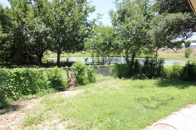 view of yard with a water view