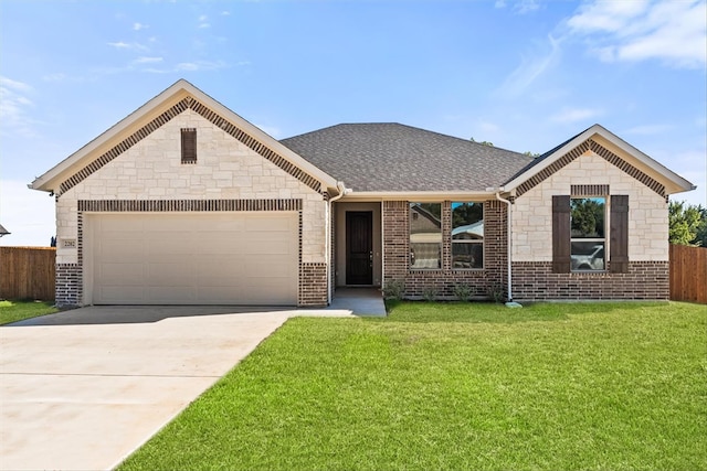 single story home with a garage and a front yard