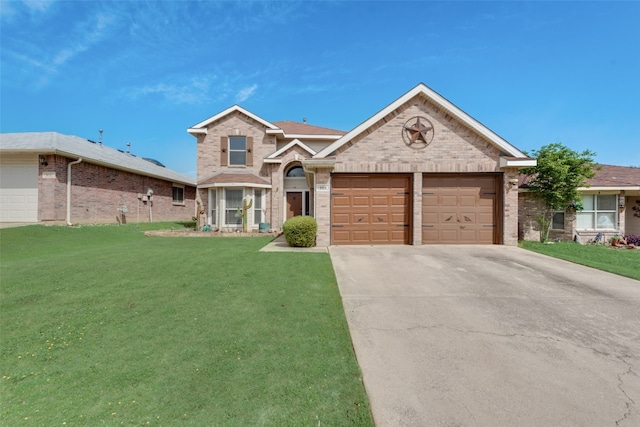 view of front of home featuring a garage and a front lawn