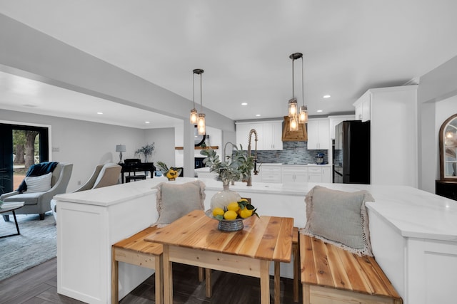 dining room with hardwood / wood-style floors