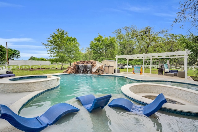 view of pool with a water slide, a pergola, outdoor lounge area, pool water feature, and an in ground hot tub